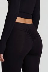 Modal Mid-Rise Flared Trousers in Black