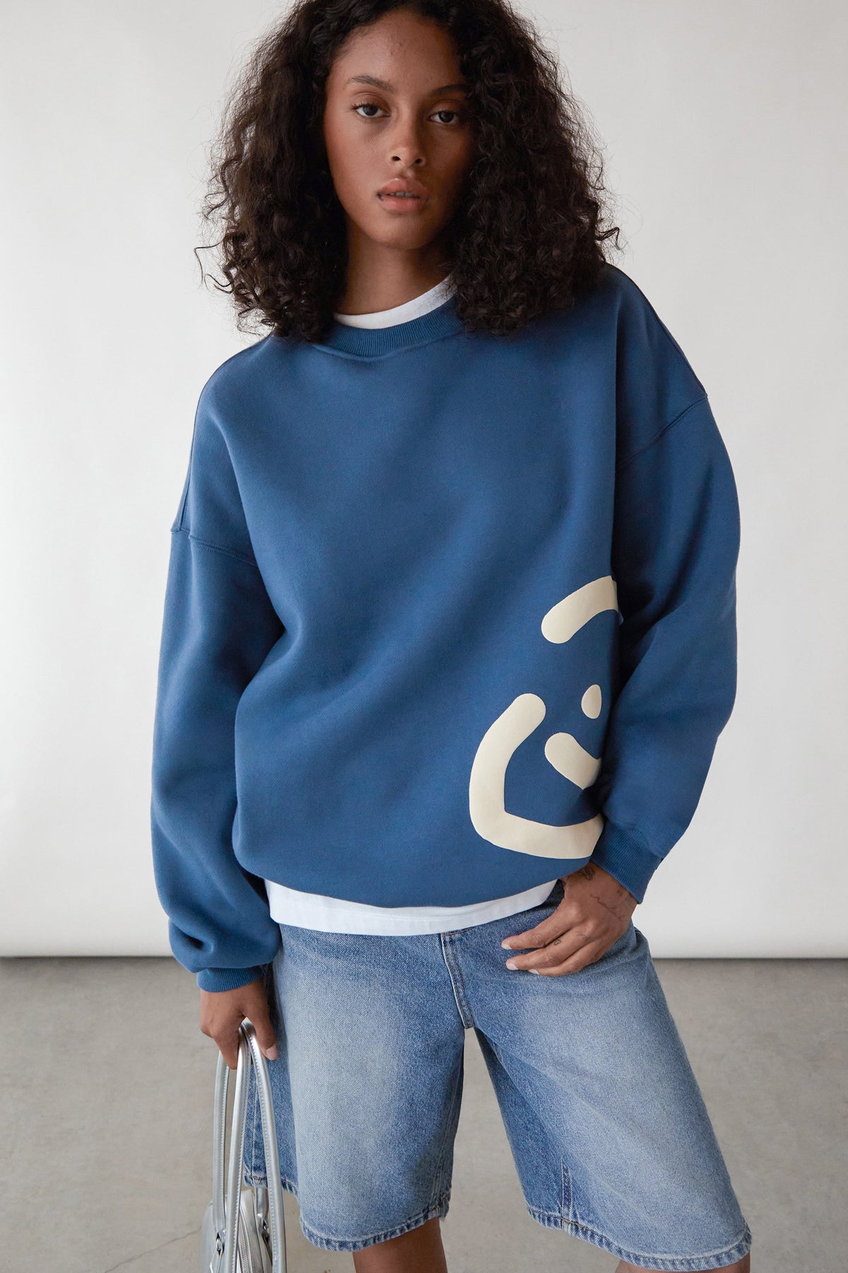 DRMERS X OAK SMILEY CREWNECK SWEATSHIRT